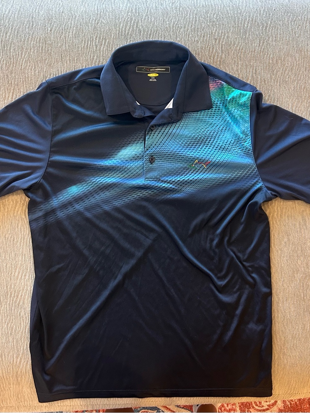 Greg Norman Collection Navy Polo with Teal Accent Wave